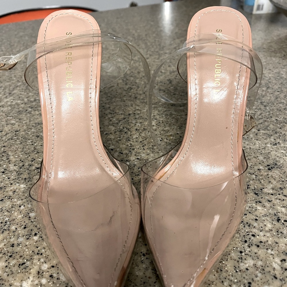 Gently worn clear pumps with crossed straps. 61/2 with box